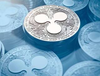 Цена XRP вышла из треугольника: возможен ли рывок к $1?