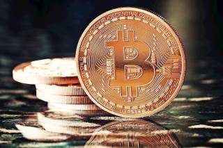 Біткоїн: підтримка на рівні $60,000 після падіння та прогнози на подальше зниження